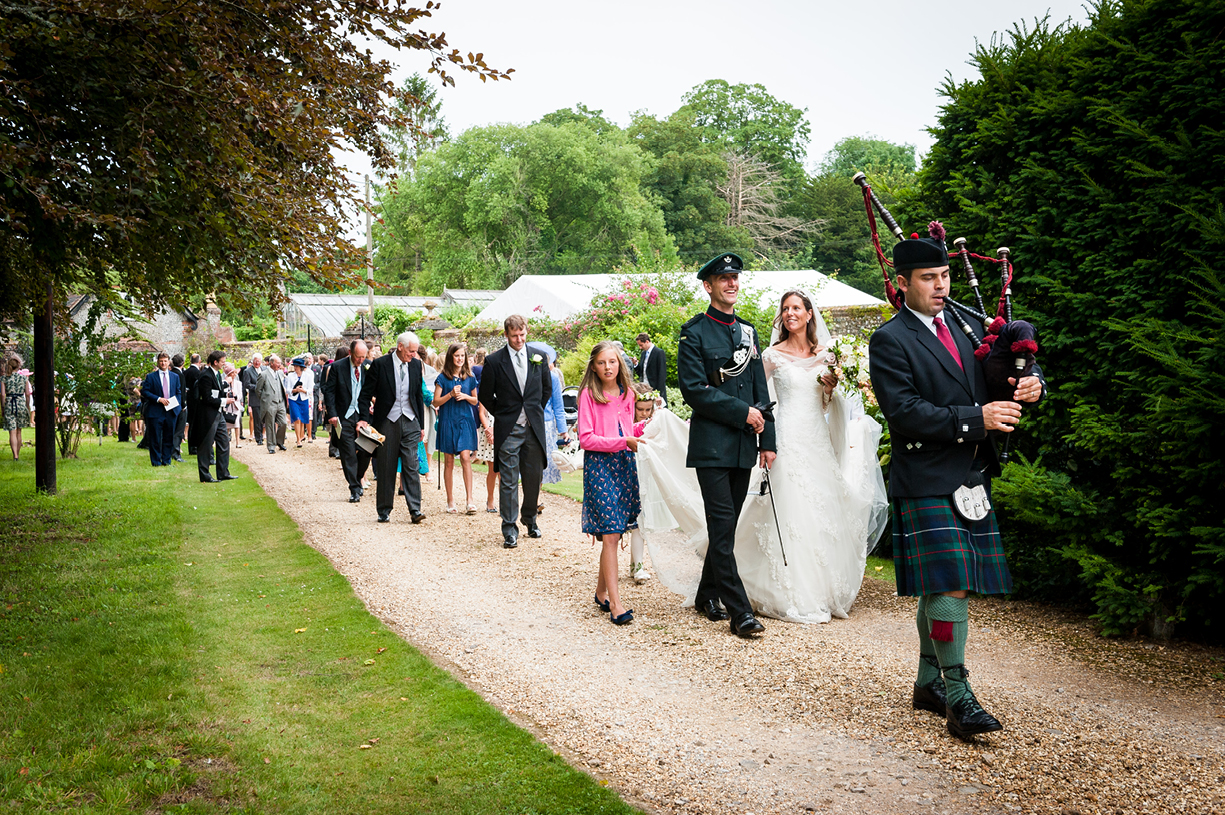 bride & groom process back to venue colour wedding photography Philippa Lepley Ovington Hampshire
